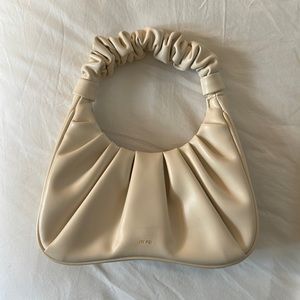 Cute beige vegan leather handbag